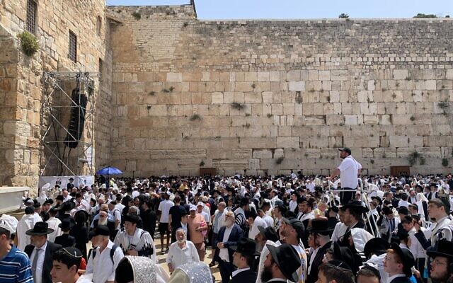 Thousands of Jewish worshipers gather for the semi-annual priestly blessing at the Western Wall in Jerusalem's Old City on April 25, 2024. (Charlie Summers/Times of Israel) Thousands of Jewish worshipers gather for the semi-annual priestly blessing at the Western Wall in Jerusalem's Old City on April 25, 2024. (Charlie Summers/Times of Israel)