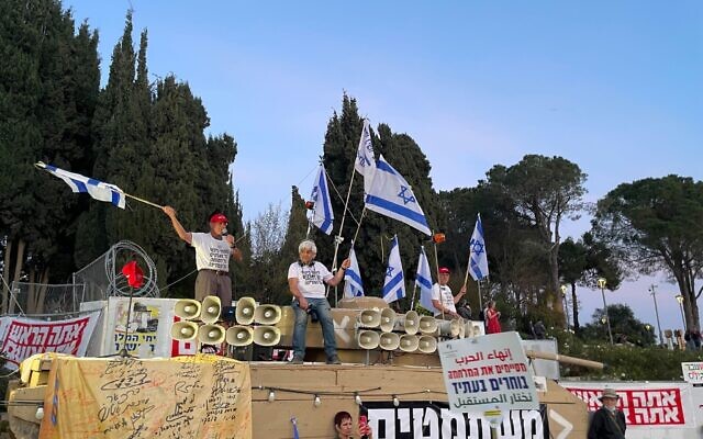 Anti-government protesters gather near the Knesset in Jerusalem on April 1, 2024. (Jessica Steinberg/Times of Israel)