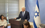 Opposition Leader Yair Lapid addresses his Yesh Atid party's weekly faction meeting in the Knesset, April 1, 2024. (Sam Sokol/Times of Israel)