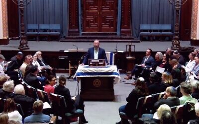 Rabbi Jeremy Kalmanofsky speaks during an Israel-solidarity service in November 2023. Kalmanofsky is among a number of American rabbis to say that Israel's war is presenting challenging questions six months in. (Screenshot via JTA)