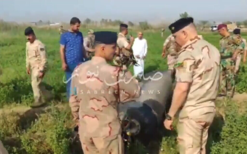Amid reports that Israeli missiles were fired at Iran overnight April 18-19, 2024, Iraqi officials inspect parts of a missile found some 45 miles southwest of Baghdad, on April 19, 2024. The footage shows what appears to be parts of a two-stage standoff air-to-surface missile. (Youtube screenshot; used in accordance with clause 27a of the copyright law)