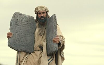 Illustrative: Avi Azulay as Moses holds the Ten Commandments in the Netflix series 'Testament: The Story of Moses.' (Courtesy Netflix)