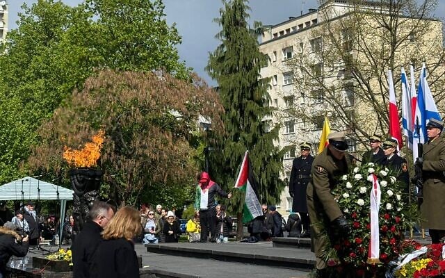 A pro-Palestinian protester takes the stage briefly at the official ceremony to commemorate the 81st anniversary of the Warsaw Ghetto Uprising in Poland, April 19, 2024. (Gabe Miner via JTA) A pro-Palestinian protester takes the stage briefly at the official ceremony to commemorate the 81st anniversary of the Warsaw Ghetto Uprising in Poland, April 19, 2024. (Gabe Miner via JTA)