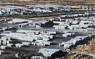 Humanitarian aid waits on the Palestinian side of the Kerem Shalom crossing in the southern Gaza Strip, in this handout photo from April 11, 2024. (COGAT)
