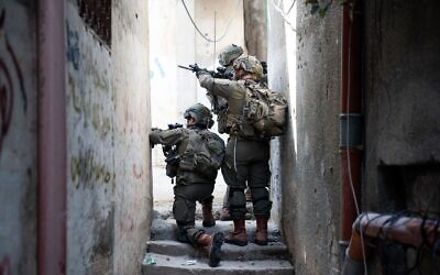 IDF troops operate in the West Bank's Nur Shams refugee camp, in an image published April 20, 2024. (Israel Defense Forces)