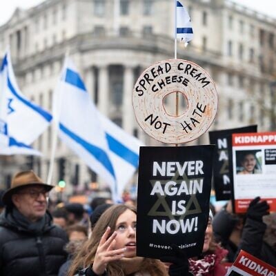 FILE: People participate in a "March Against Antisemitism" in London on November 26, 2023. (Andy Solomon / Shutterstock)