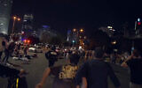 The scene where a driver ran over protesters during a demonstration calling for the release of Israeli hostages held in the Gaza Strip and against the current Israeli government, Tel Aviv, April 6, 2024. (Courtesy of Itai Raziel)