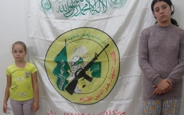 Ela (L) and Dafna Elyakim are seen in a photo released by the IDF on May 19, 2024, which was taken while the two sisters were held captive by Hamas terrorists in the Gaza Strip last year. (Israel Defense Forces) Ela (L) and Dafna Elyakim are seen in a photo released by the IDF on May 19, 2024, which was taken while the two sisters were held captive by Hamas terrorists in the Gaza Strip last year. (Israel Defense Forces)