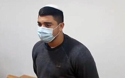 Afik Toibi, a border guard who is suspected of killing his comrade, Sgt. Naim Maadi, is indicted in a Haifa District Court on March 10, 2021. (Screen capture/X; used in accordance with Clause 27a of the Copyright Law)