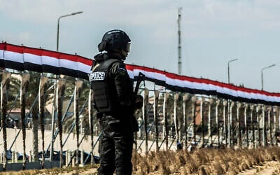 File: A picture taken on October 21, 2017, shows an Egyptian policeman standing guard in the new city of el-Alamein, west of Alexandria. (Khaled Desouki/AFP)