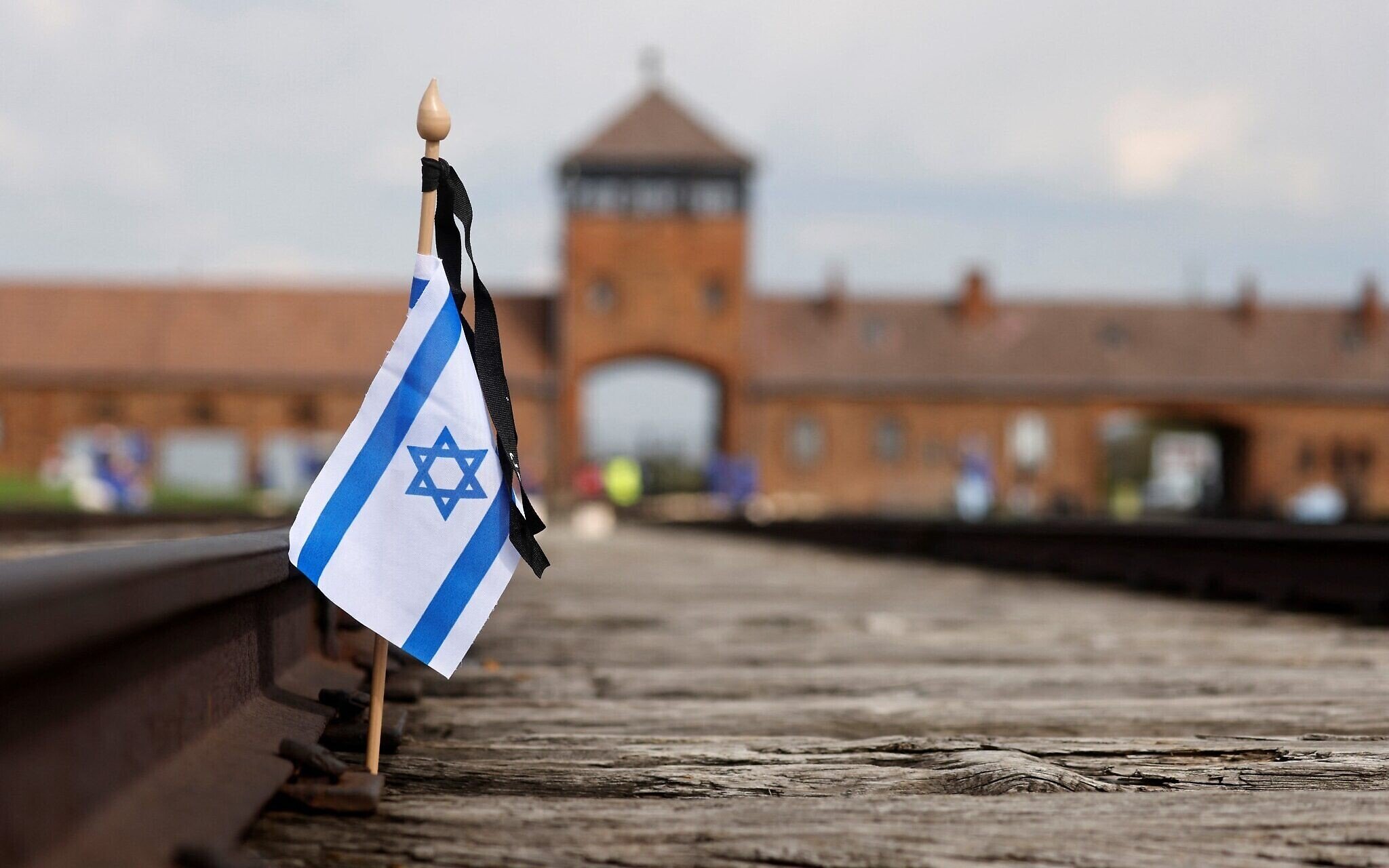 NextImg:Auschwitz museum defends barring IDF group from bringing Israeli flags into Birkenau