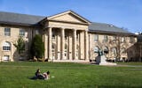 Cornell University students sit outside on November 3, 2023, in Ithaca, New York. (Matt Burkhartt/ Getty Images/ AFP)