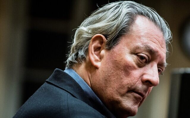 File: US writer Paul Auster looks on in Lyon, France, on January 16, 2018. (JEFF PACHOUD / AFP)