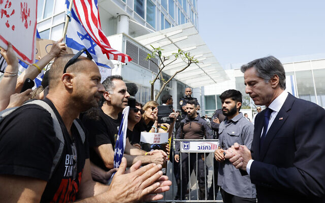 US Secretary of State Antony Blinken (R) meets with the families of the hostages held by Hamas, outside of a hotel, in Tel Aviv, on May 1, 2024. (Evelyn Hockstein / POOL / AFP)