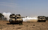 Israeli tanks near the border with the Gaza Strip on May 2, 2024. (Menahem Kahana/AFP)