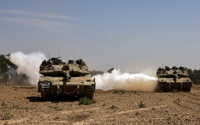 Israeli tanks near the border with the Gaza Strip on May 2, 2024. (Menahem Kahana/AFP)