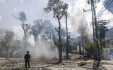 Security forces and emergency personnel deploy at a site hit by rockets fired from southern Lebanon in the northern city of Kiryat Shmona, on May 5, 2024. (Jalaa MAREY / AFP)