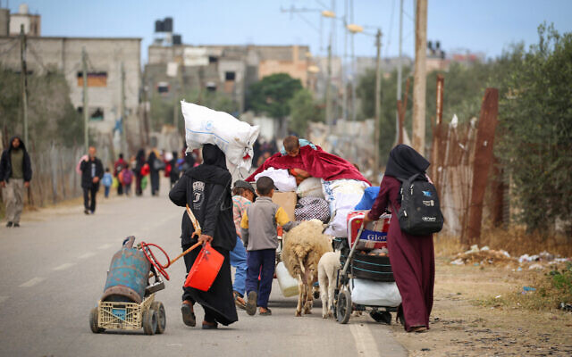 Palestinians in Rafah in the southern Gaza Strip carry their belongings following a call to evacuate by the Israeli army on May 6, 2024 (AFP) Palestinians in Rafah in the southern Gaza Strip carry their belongings following a call to evacuate by the Israeli army on May 6, 2024 (AFP)