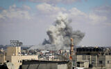 A picture taken on May 6, 2024, shows smoke billowing following bombardment east of Rafah in the southern Gaza Strip. (AFP)