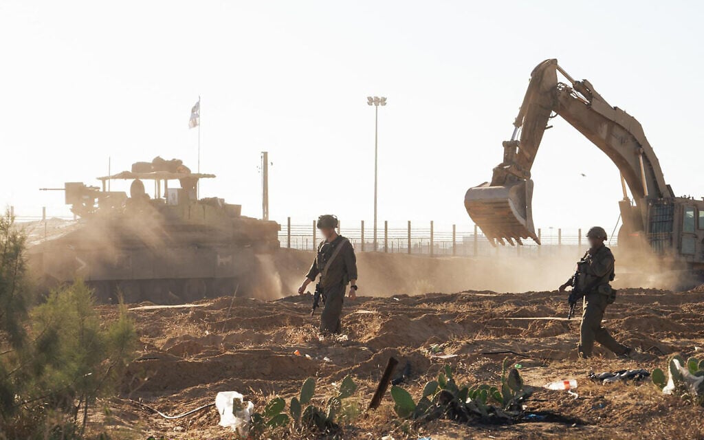This handout picture released by the Israel Defense Forces on May 8, 2024, shows Israeli forces operating in Rafah in the southern Gaza Strip. (Photo by Israeli Army / AFP)