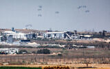 Humanitarian aid packages are dropped on the Gaza Strip on May 9, 2024. (Ahmad Gharabli/AFP)