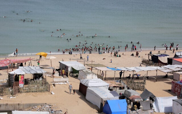 Tents housing internally displaced Palestinians stand on the beach in Deir el-Balah in the central Gaza Strip on May 10, 2024. (Photo by AFP)
