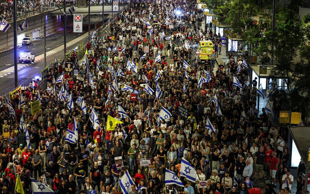 Demonstrators gather during a rally calling for the release of Israelis held hostage by Hamas in Gaza, outside the Kirya military headquarters in Tel Aviv on May 11, 2024. (Jack Guez/AFP)