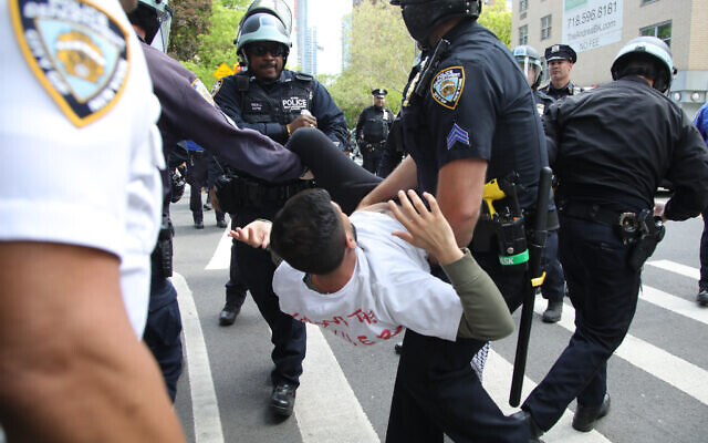 An anti-Israel protester is arrested by NYPD officers during a march to mark the 76th anniversary of Nakba, or the "catastrophe" of the creation of Israel, in the Brooklyn borough of New York on May 11, 2024. (Leonardo Munoz/AFP) An anti-Israel protester is arrested by NYPD officers during a march to mark the 76th anniversary of Nakba, or the "catastrophe" of the creation of Israel, in the Brooklyn borough of New York on May 11, 2024. (Leonardo Munoz/AFP)