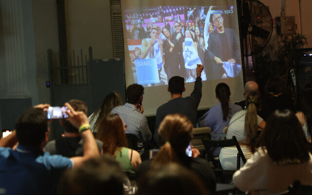 People watch the final of the 68th Eurovision Song Contest (ESC) 2024 at a bar in Tel Aviv on May 12, 2024 (GIL COHEN-MAGEN / AFP) People watch the final of the 68th Eurovision Song Contest (ESC) 2024 at a bar in Tel Aviv on May 12, 2024 (GIL COHEN-MAGEN / AFP)