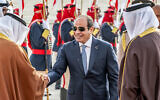 This handout picture from the official Bahrain News Agency (BNA) shows Egypt's President Abdel Fattah el-Sissi (C) being received in Manama on May 15, 2024 ahead of the 33rd Arab League Summit. (BNA (Bahrain News Agency) / AFP)
