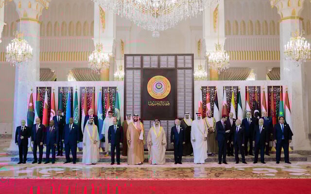 This handout picture from the official Bahrain News Agency (BNA) shows Bahrain's King Hamad bin Isa al-Khalifa (C) posing with Arab leaders in Manama on May 16, 2024 ahead of the 33rd Arab League Summit. (Bahrain News Agency/AFP)