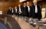 File - Judges at the International Court of Justice arrive to hear South African arguments over Israel's Rafah offensive at The Hague, May 16, 2024. (Nick Gammon/AFP)