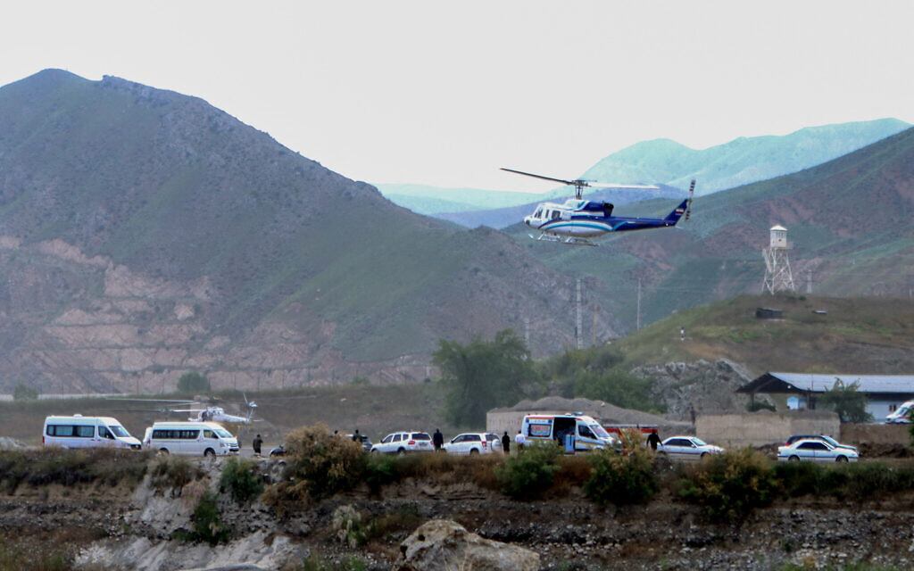 The helicopter carrying Iran's President Ebrahim Raisi taking off at the Iranian border with Azerbaijan, after the inauguration of the dam of Qiz Qalasi, in Aras, on May 19, 2024. (Ali Hamed Haghdoust/ Islamic Republic News Agency (IRNA)/ AFP)