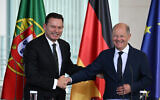 German Chancellor Olaf Scholz (R) and Portuguese Prime Minister Luis Montenegro shake hands at the end of a joint press conference after talks at the Chancellery in Berlin, Germany, May 24, 2024. (Ralf Hirschberger / AFP)