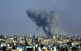 Smoke billows following Israeli airstrikes on Rafah, in the southern Gaza Strip, on May 25, 2024. (Eyad Baba / AFP)