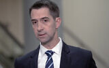 US Senator Tom Cotton speaks with reporters at the Senate Subway on Capitol Hill, March 20, 2024, in Washington. (AP Photo/ Mariam Zuhaib)