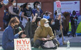 New York University students and anti-Israel, pro-Palestinian supporters rally outside the NYU Stern School of Business building, April 22, 2024, in New York. (AP Photo/Mary Altaffer)