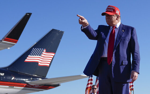 Presumed Republican presidential candidate former US president Donald Trump gestures at a campaign rally in Freeland, Michigan, May 1, 2024. (Paul Sancya/AP) Presumed Republican presidential candidate former US president Donald Trump gestures at a campaign rally in Freeland, Michigan, May 1, 2024. (Paul Sancya/AP)