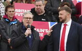 Newly elected British Labour MP Chris Webb, right, with Labour leader Sir Keir Starmer celebrating at Blackpool Cricket Club, England, May 3, 2024, after being declared winner in the Blackpool South by-election. (Peter Byrne/PA via AP)