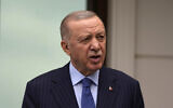 Turkish President Recep Tayyip Erdogan speaks to the media during a press conference following the Friday noon prayer in Istanbul, May 3, 2024. (Khalil Hamra/AP Photo)