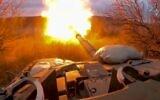 FILE - In this photo released by the Russian Defense Ministry on March 19, 2024, a Russian tank fires at Ukrainian troops from a position near the border with Ukraine in Russia’s Belgorod region. (Russian Defense Ministry Press Service via AP, File)