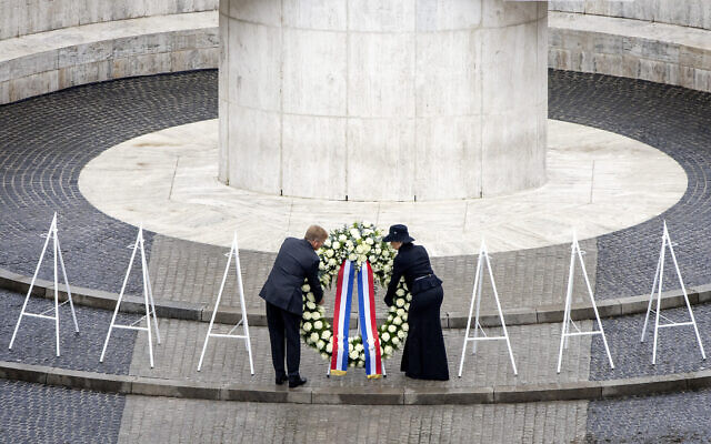 Dutch King Willem-Alexander and Queen Maxima lay a wreath during a solemn annual national service to commemorate the dead in World War II in Amsterdam, Netherlands, May 4, 2024. (Remko de Waal/ANP/Pool Photo via AP) Dutch King Willem-Alexander and Queen Maxima lay a wreath during a solemn annual national service to commemorate the dead in World War II in Amsterdam, Netherlands, May 4, 2024. (Remko de Waal/ANP/Pool Photo via AP)