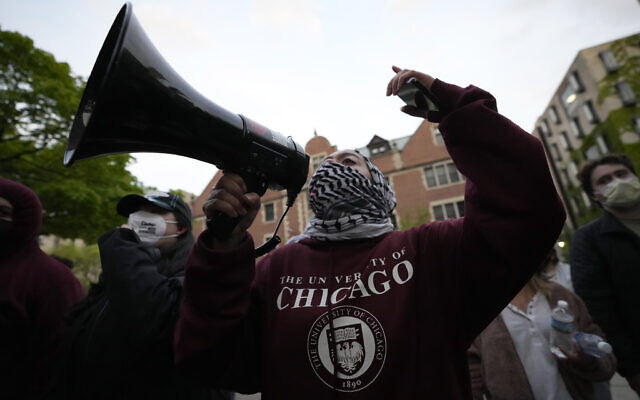 Illustrative: An anti-Israel protester leads chants at the university's police as they are kept from the university's quad while the student encampment is dismantled at the University of Chicago, on May 7, 2024, in Chicago. (AP Photo/Charles Rex Arbogast) Illustrative: An anti-Israel protester leads chants at the university's police as they are kept from the university's quad while the student encampment is dismantled at the University of Chicago, on May 7, 2024, in Chicago. (AP Photo/Charles Rex Arbogast)