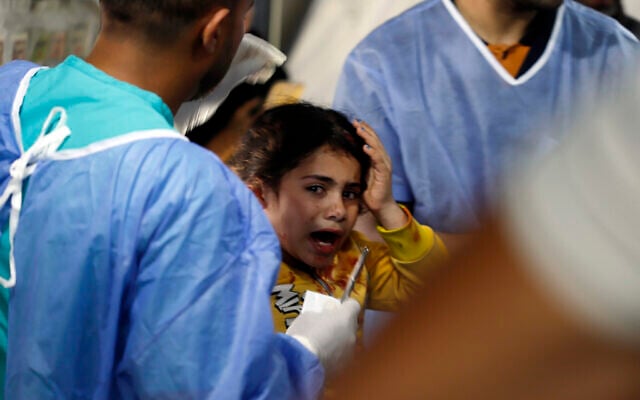 Palestinian medics treat a girl wounded in the Israeli bombardment of the Gaza Strip at the Kuwaiti Hospital in Rafah refugee camp, southern Gaza, May 7, 2024. (AP Photo/Ramez Habboub) Palestinian medics treat a girl wounded in the Israeli bombardment of the Gaza Strip at the Kuwaiti Hospital in Rafah refugee camp, southern Gaza, May 7, 2024. (AP Photo/Ramez Habboub)