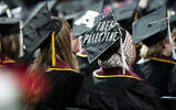 Illustrative: A student sits with her cap decorated to read "Free Palestine" while attending the University of Minnesota's College of Liberal Arts graduation ceremony, on May 12, 2024, in Minneapolis, Minnesota. (Angelina Katsanis/AP)
