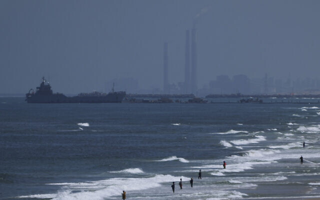 A ship is seen off the coast of Gaza near a US-built floating pier that will be used to facilitate aid deliveries, as seen from the central Gaza Strip, Thursday, May 16, 2024. (AP/Abdel Kareem Hana) A ship is seen off the coast of Gaza near a US-built floating pier that will be used to facilitate aid deliveries, as seen from the central Gaza Strip, Thursday, May 16, 2024. (AP/Abdel Kareem Hana)
