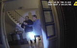 File: In this image taken from San Francisco Police Department body-camera video, the husband of former US House Speaker Nancy Pelosi, Paul Pelosi, right, fights for control of a hammer with his assailant David DePape during a brutal attack in the couple's San Francisco home, on Oct. 28, 2022 (San Francisco Police Department via AP, File)