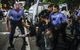 A protester is taken into custody at S. 34th St. near the University of Pennsylvania campus in Philadelphia on May 17, 2024. (Steven M. Falk/The Philadelphia Inquirer via AP)