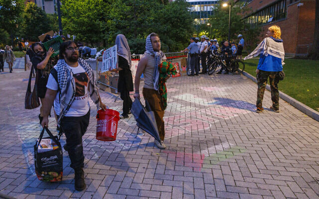 Protesters leave an anti-Israel encampment at Drexel University, May 23, 2004 in Philadelphia. (Alejandro A. Alvarez/The Philadelphia Inquirer via AP) Protesters leave an anti-Israel encampment at Drexel University, May 23, 2004 in Philadelphia. (Alejandro A. Alvarez/The Philadelphia Inquirer via AP)