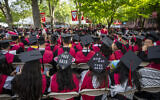 Students wear signs in support of Gaza on their mortarboards during commencement in Harvard Yard, at Harvard University, in Cambridge, Massachusetts, May 23, 2024. (AP/Ben Curtis)